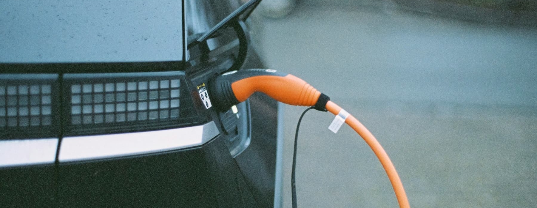 view of a vehicle with a EV charger 