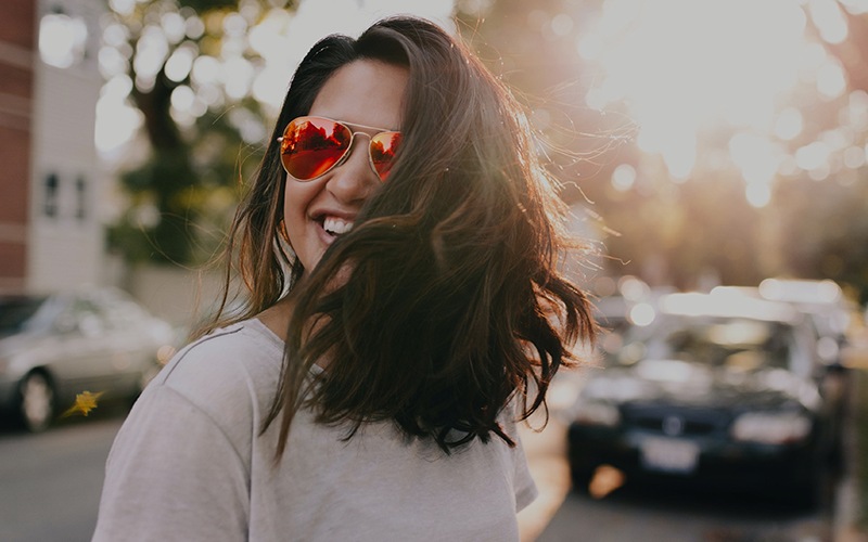 a woman outside in a city area